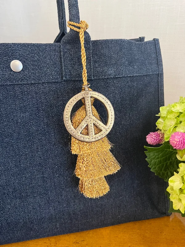 Avant-Garde Style Promotions East West Bundle: Denim + Gold Tassel + Gold Peace Sign Charm Must-Have Bags At Irresistible Discounts Avant-Garde Style Promotions East West Bundle: Denim + Gold Tassel + Gold Peace Sign Charm Must-Have Bags At Irresistible Discounts