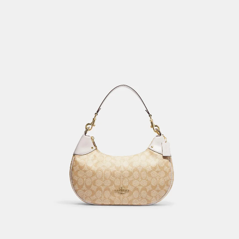 Coach Outlet Mara Hobo In Signature Canvas Fashion-Forward Bags, Now On Sale
