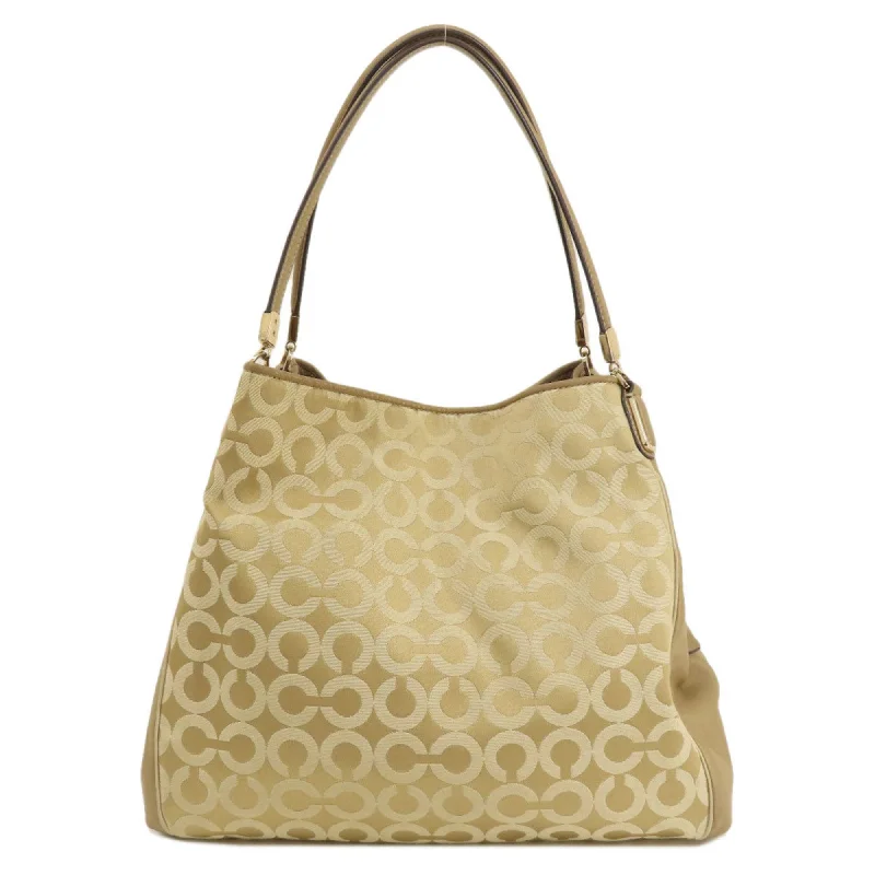 Coach Madison Canvas Tote Bag (Pre-Owned) Luxury Meets Affordability – Shop Stunning Bags Now Coach Madison Canvas Tote Bag (Pre-Owned) Luxury Meets Affordability – Shop Stunning Bags Now