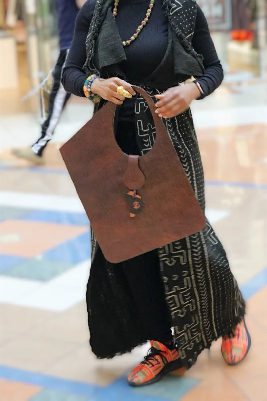 Unveiling Mali: Handmade Leather Bag Showcasing African Craftsmanship The Best Handbag Offers Are Here Unveiling Mali: Handmade Leather Bag Showcasing African Craftsmanship The Best Handbag Offers Are Here